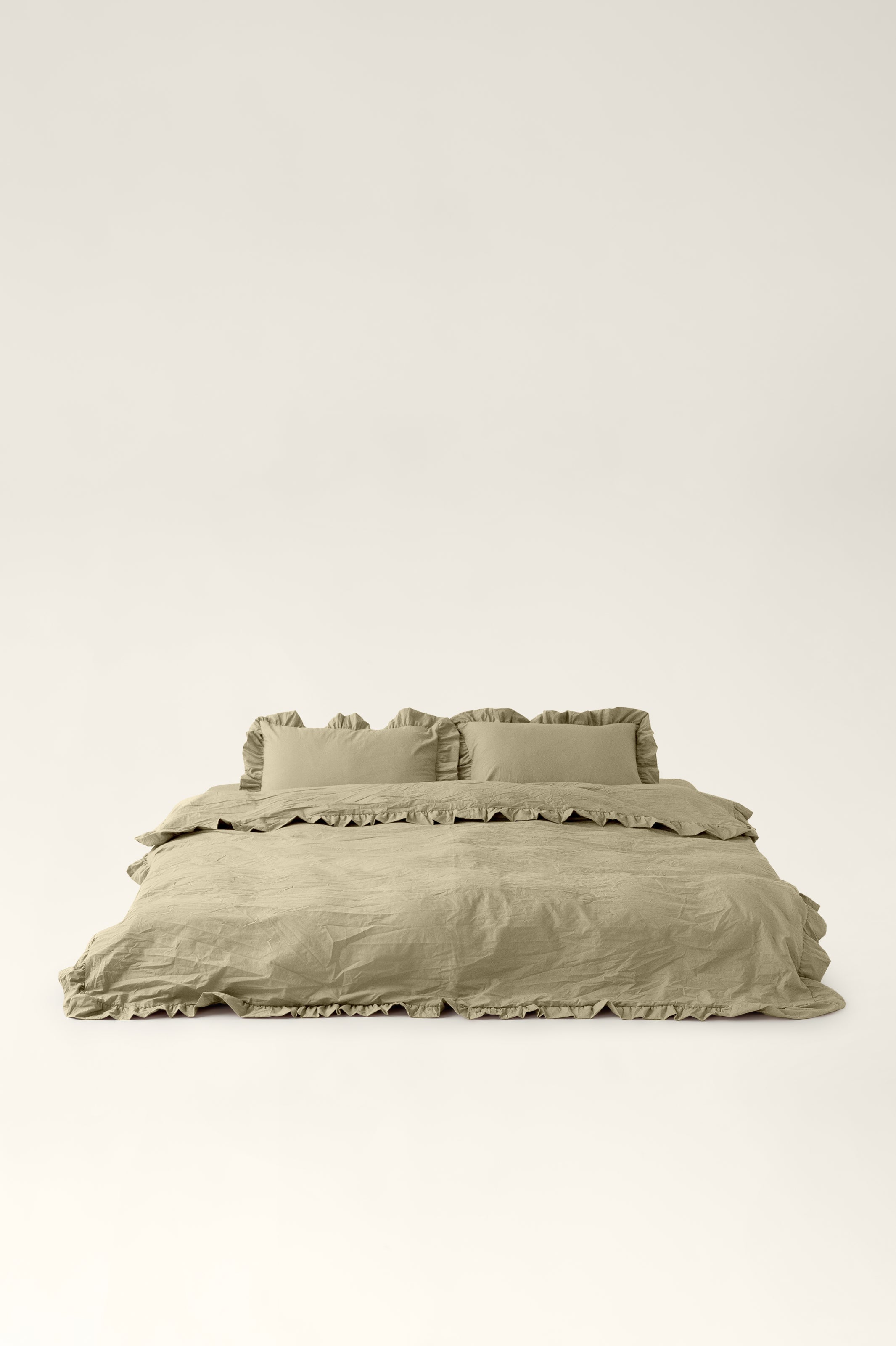 Washed cotton bedding with ruffles Pistachio